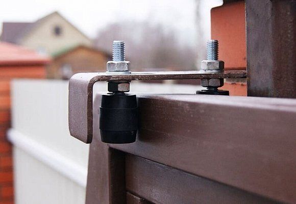 Как правильно подобрать петли для откатных ворот?